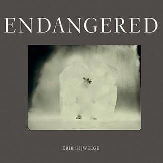 hardcover art coffee table book about endangered animals by Erik Hijweege