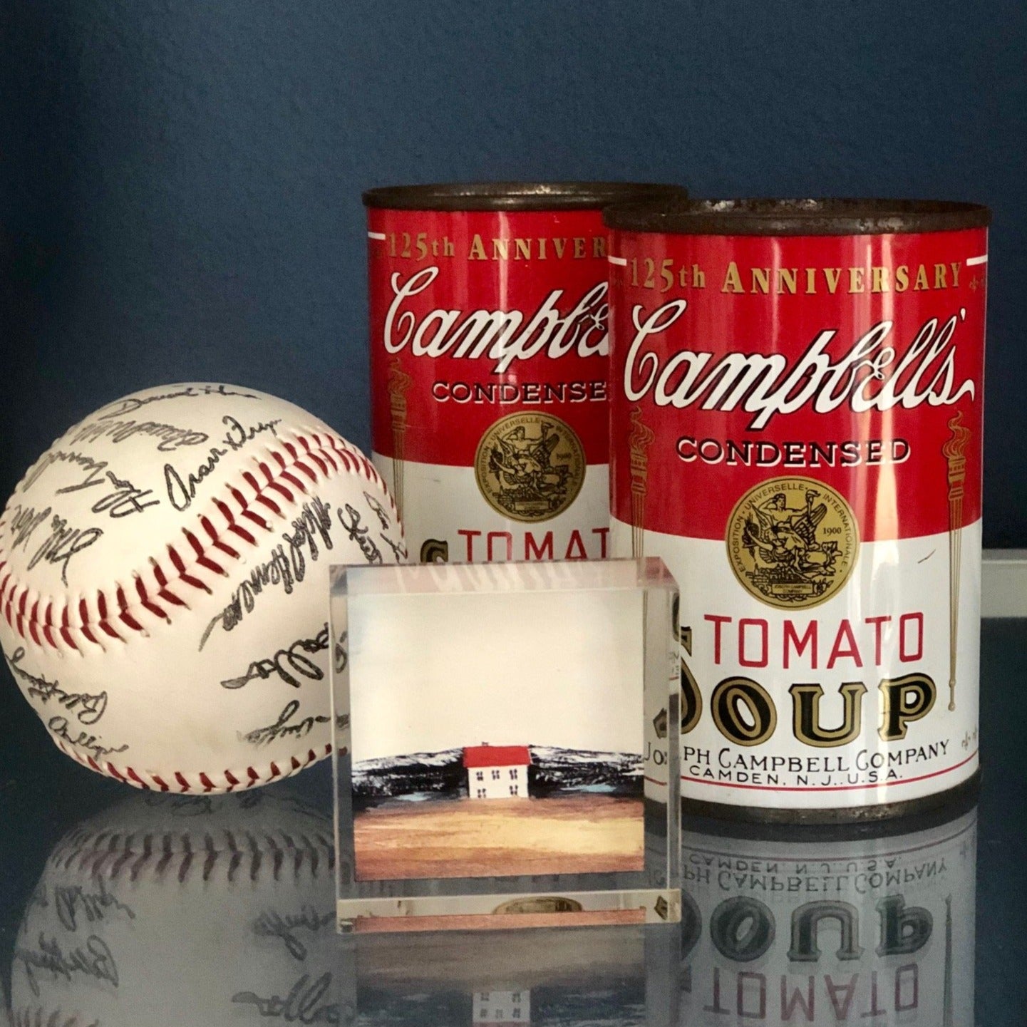 signed base ball with Campbell soup cans and art work