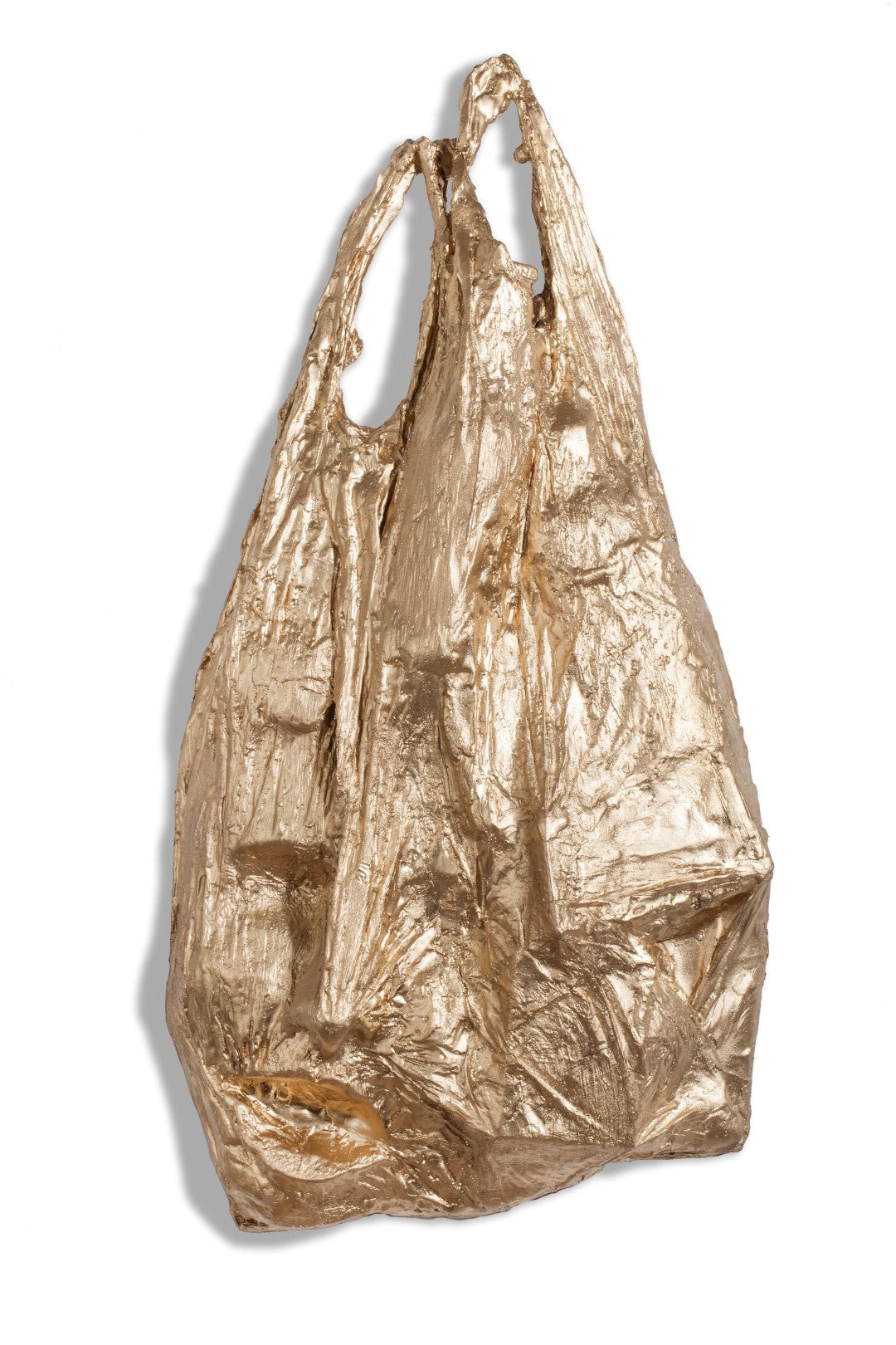 sculpture in bronze of plastic bags to address our consumer society
