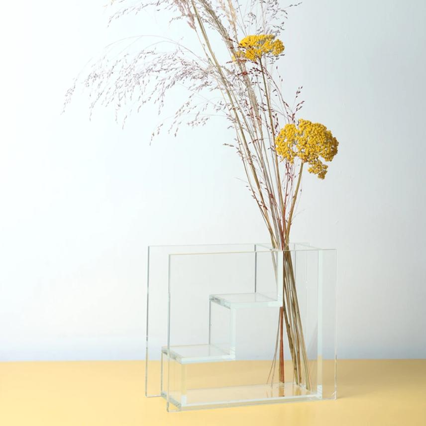 glass staircase vase inspired by dutch painter piet mondriaan with yellow flowers
