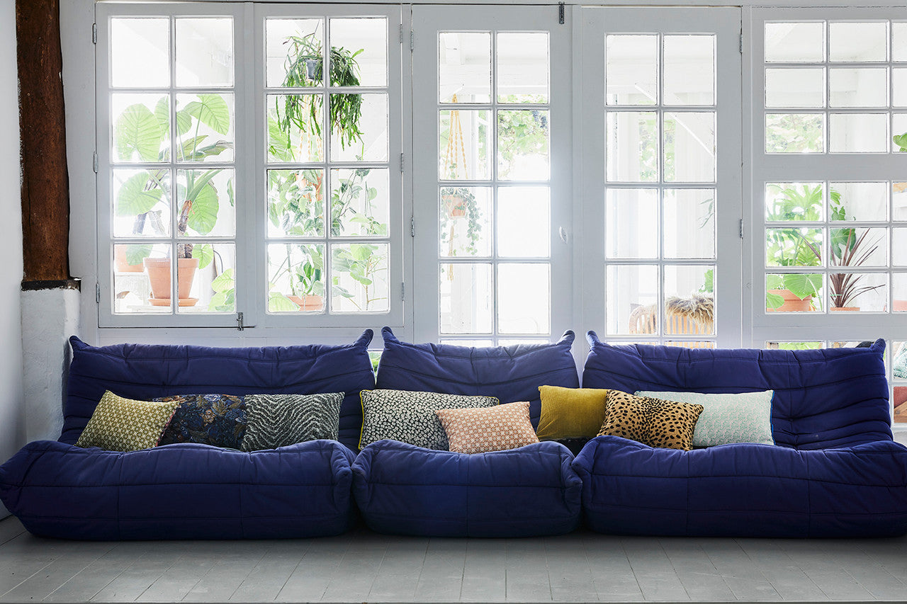 pillows on a Linge Roset sofa