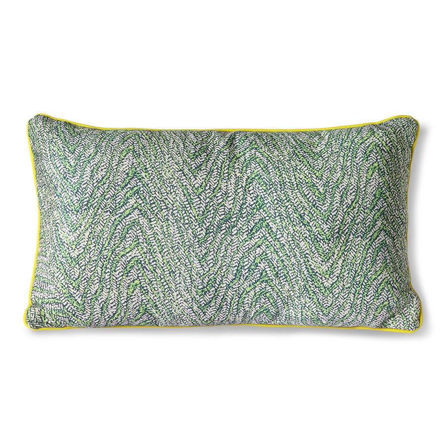 green printed pillow with yellow trim piping