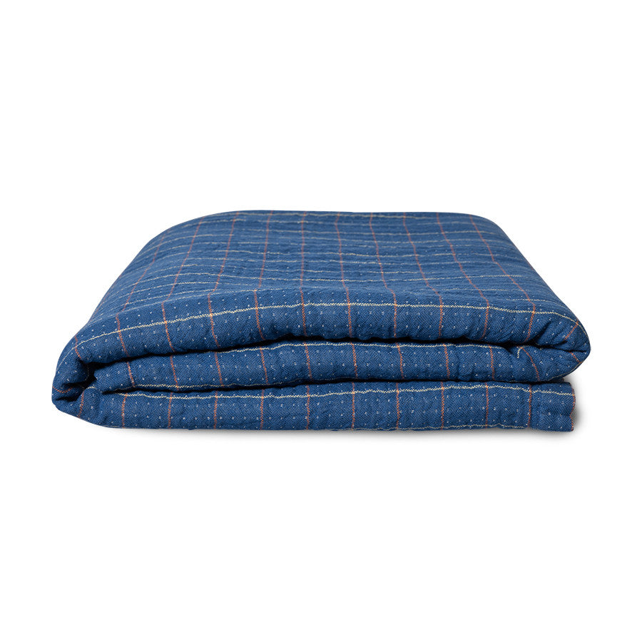 blue throw blanket, folded