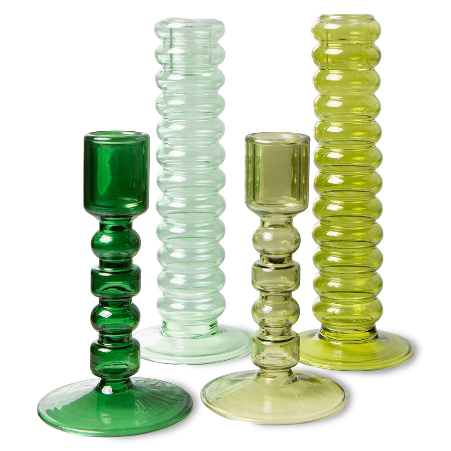4 different height glass candle holders green