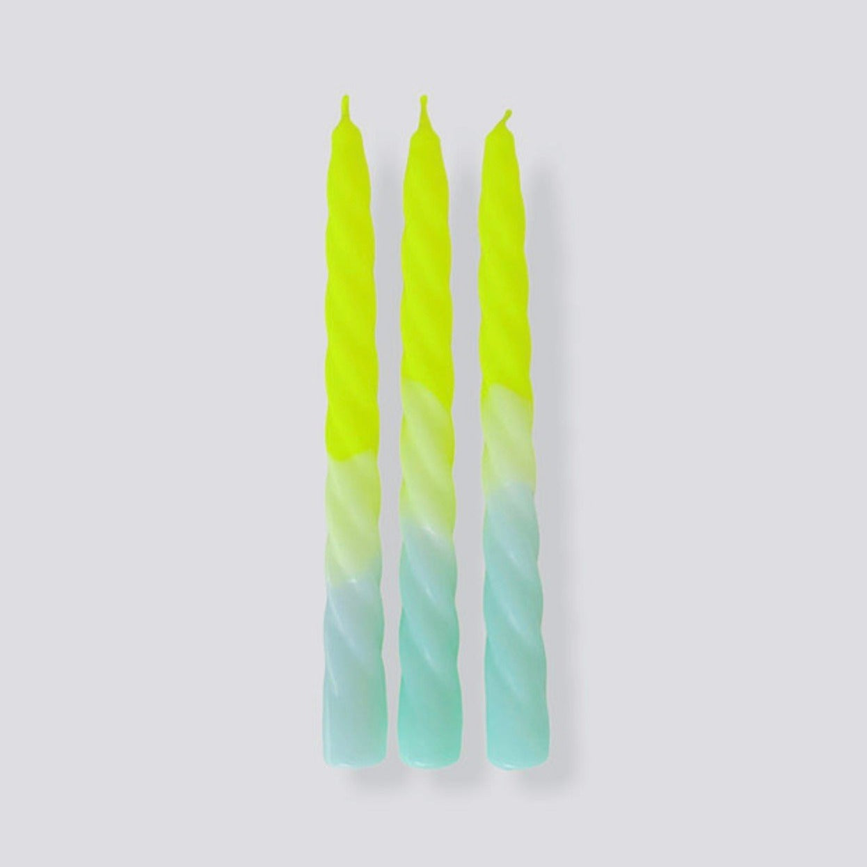 yellow and blue dipped dyed twisted candles