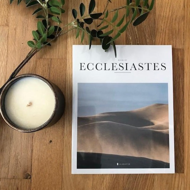 Bible book Ecclesiastes with HKliving USA candle and leafs