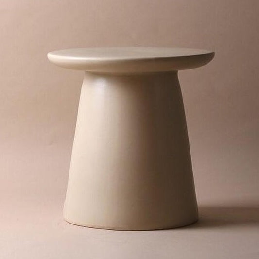 earthenware accent table in neutral color