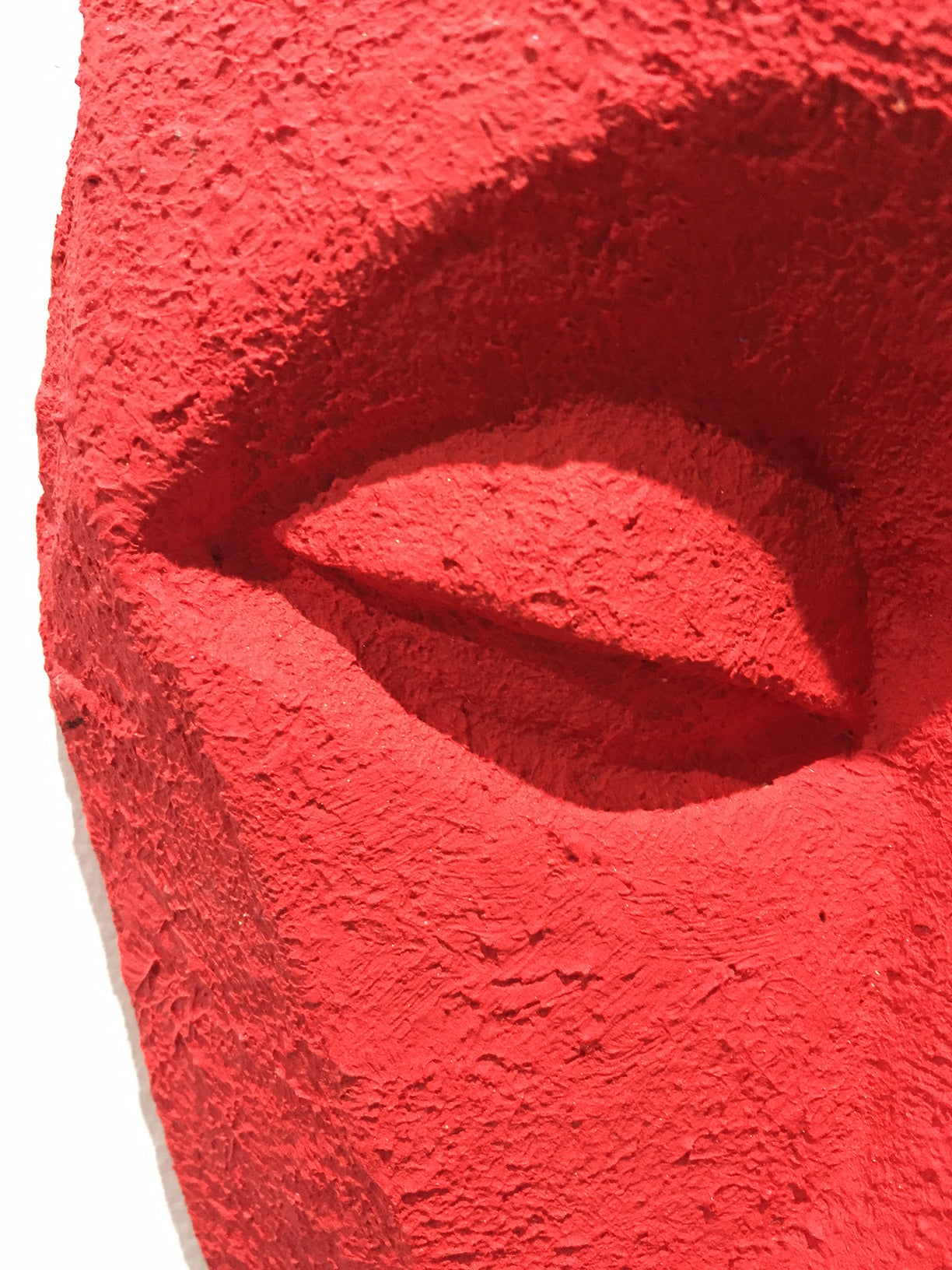 detail of 3d red bronze sculpture of putin